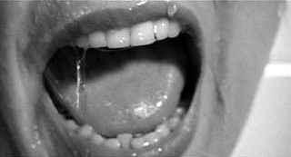 Here Alfred Hitchcock uses an extreme closeup with almost zero negative space in Psycho, to emphasis this dramatic and frightening moment in time.